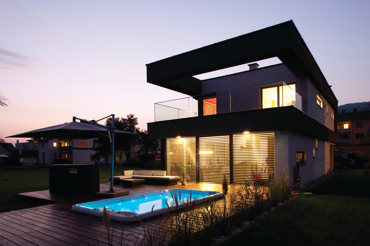 TidalFit swim spa installed on a backyard patio